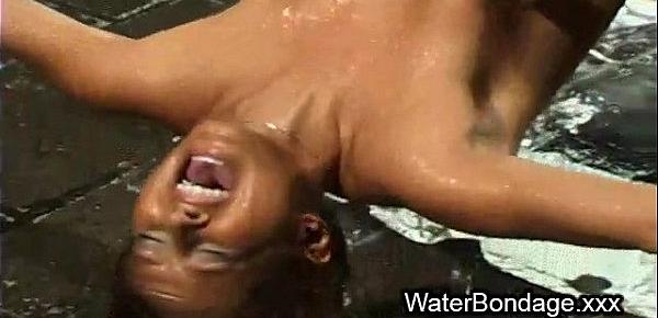  Tied blonde hottie tortured with ice and sunk in water tank